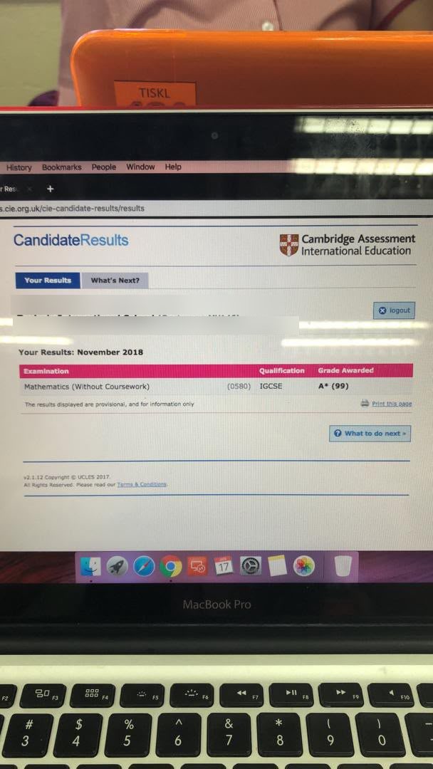 Cambridge candidate results showing IGCSE Mathematics grade A star with 99