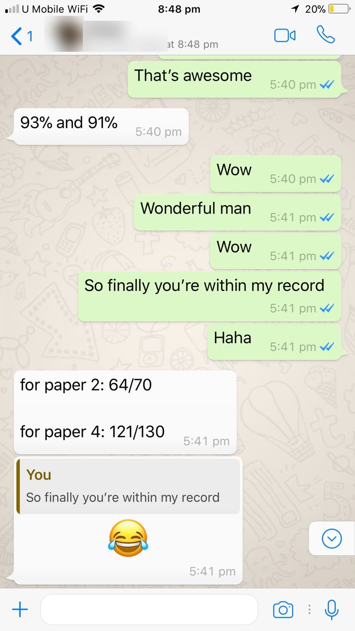 Anonymised student message with scores of 64 out of 70 and 121 out of 130